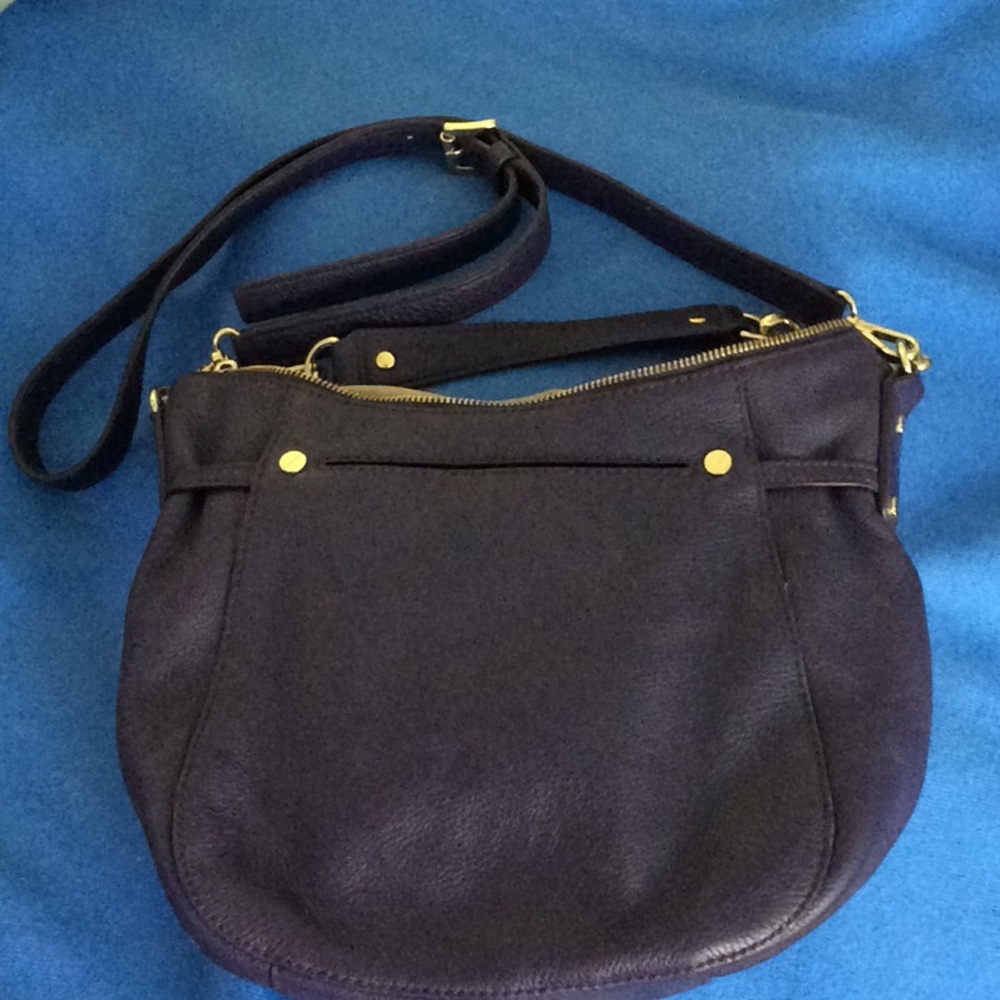 Michael Koran Megan purple ladies handbag.